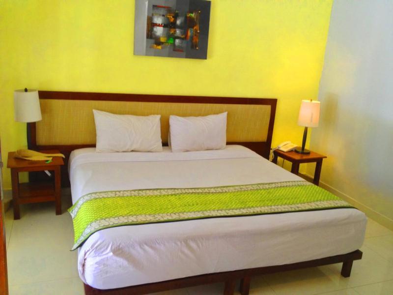 Jambuluwuk Oceano Gili Trawangan Hotell Rom bilde A bedroom at the hotel